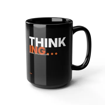 Black mug reading THINKING with orange dots